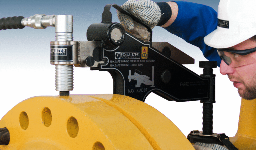 Flange Alignment tool with worker on a flange.