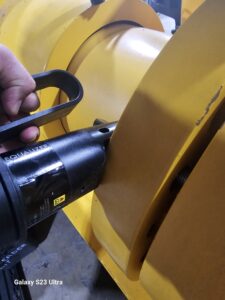 Back side of nut splitter on a flange.