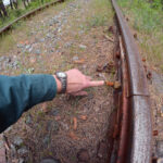 Rusted nut on a rail road track